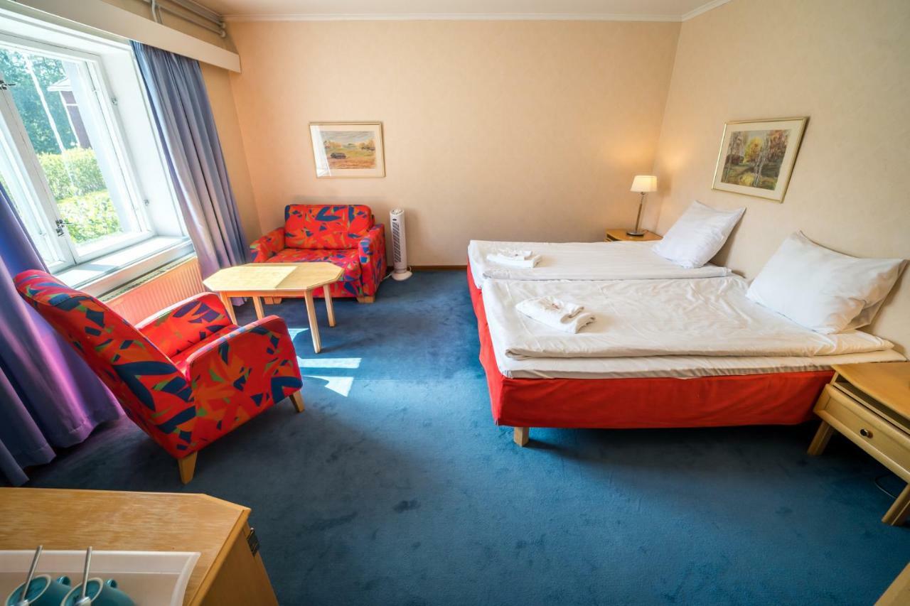 Karolineburg Manor House Hotel Каяани Номер фото